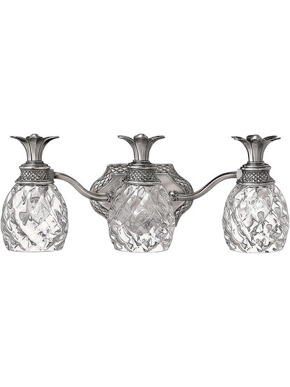 Pineapple Triple Bath Sconce With Clear Optic Glass in Polished Antique Nickel.